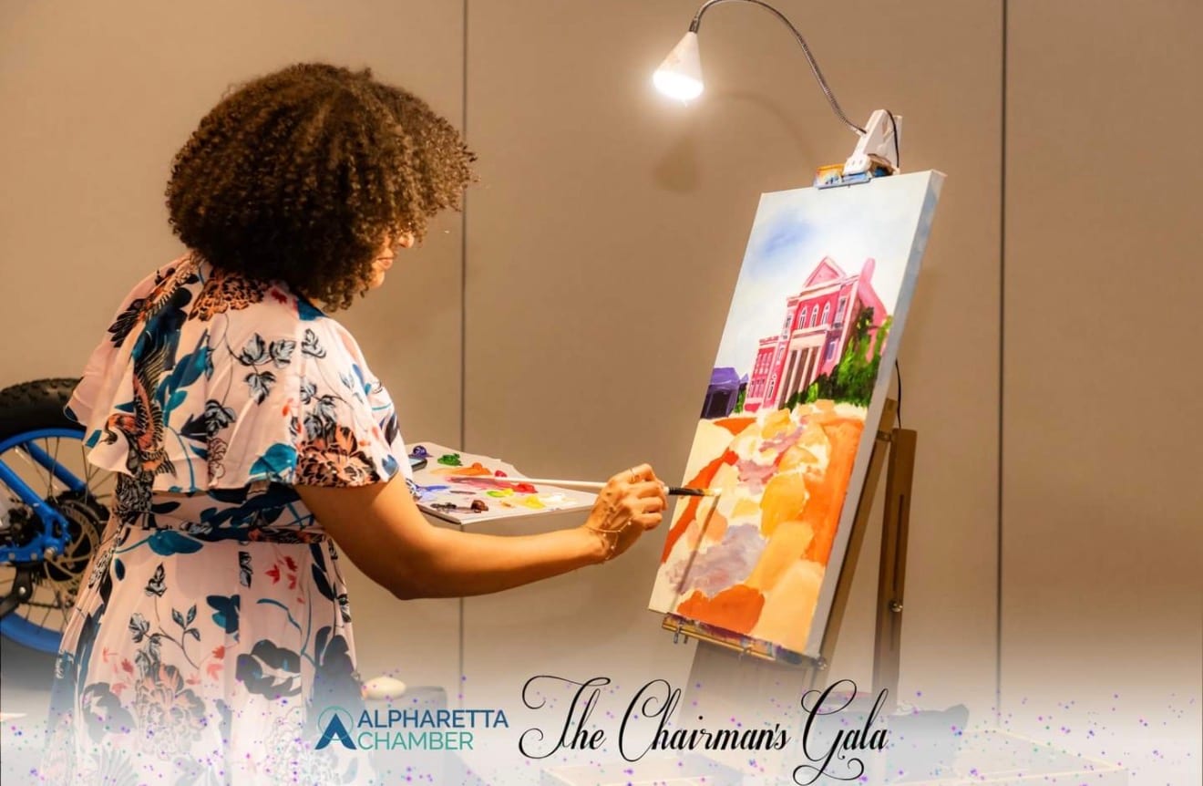 Reinilda painting live at the Alpharetta Chamber Chairman's Gala